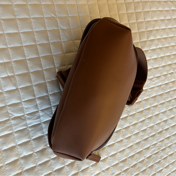 MON1500 Crafted with water-resistant, ultra microfiber vegan leather, the - Picture 2 of 10